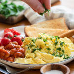 Plate of Scrambled Eggs and Tomatoes